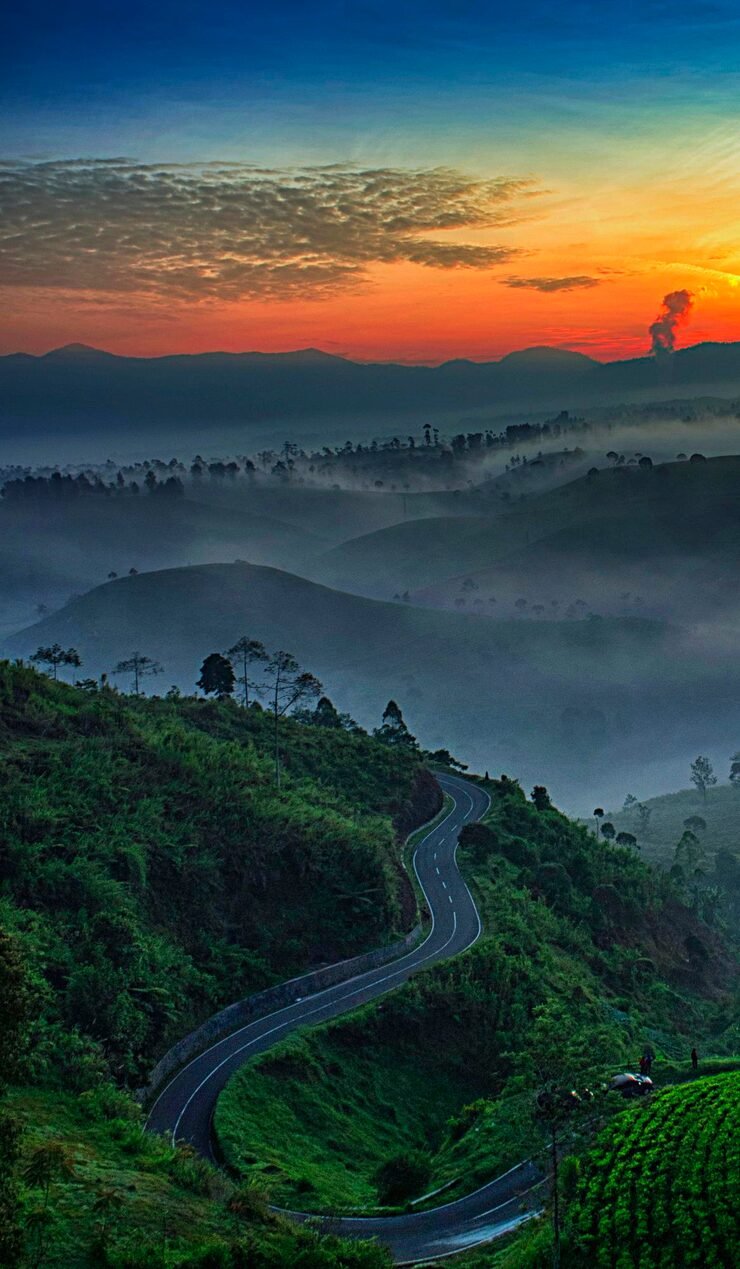 high angle view winding road against sky sunset 1048944 3513520