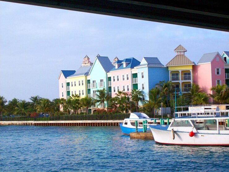 swimming pool by houses against sky 1048944 2496364